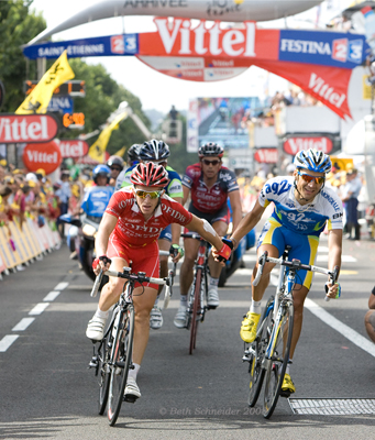 Dumoulin and Dessel holding hands as they crossed the finish line Dumoulin and Dessel holding hands as they crossed the finish line