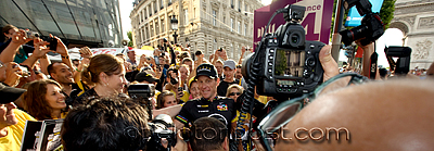 Lance mobbed by the media